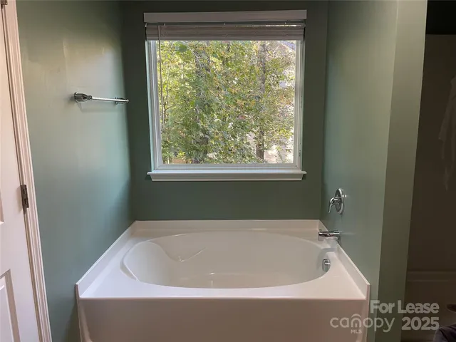 a bathroom with a bathtub