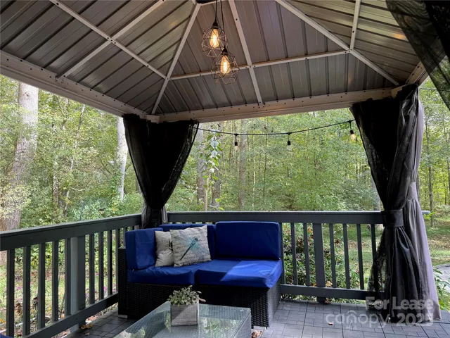 a view of a two chairs in the deck