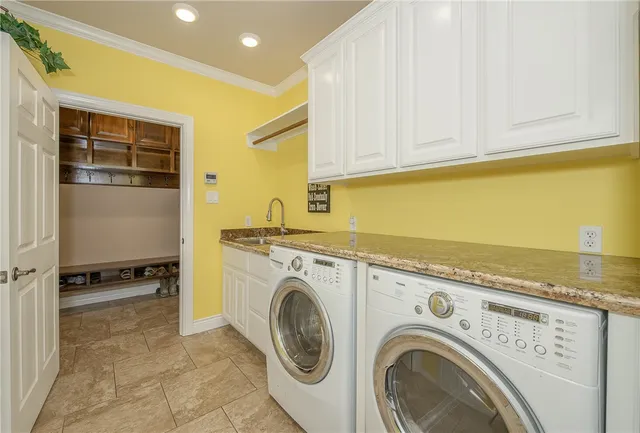 a front view of a house with a garden and porch