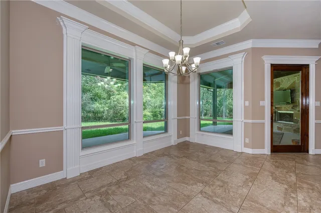 a large bathroom with a large tub and sink