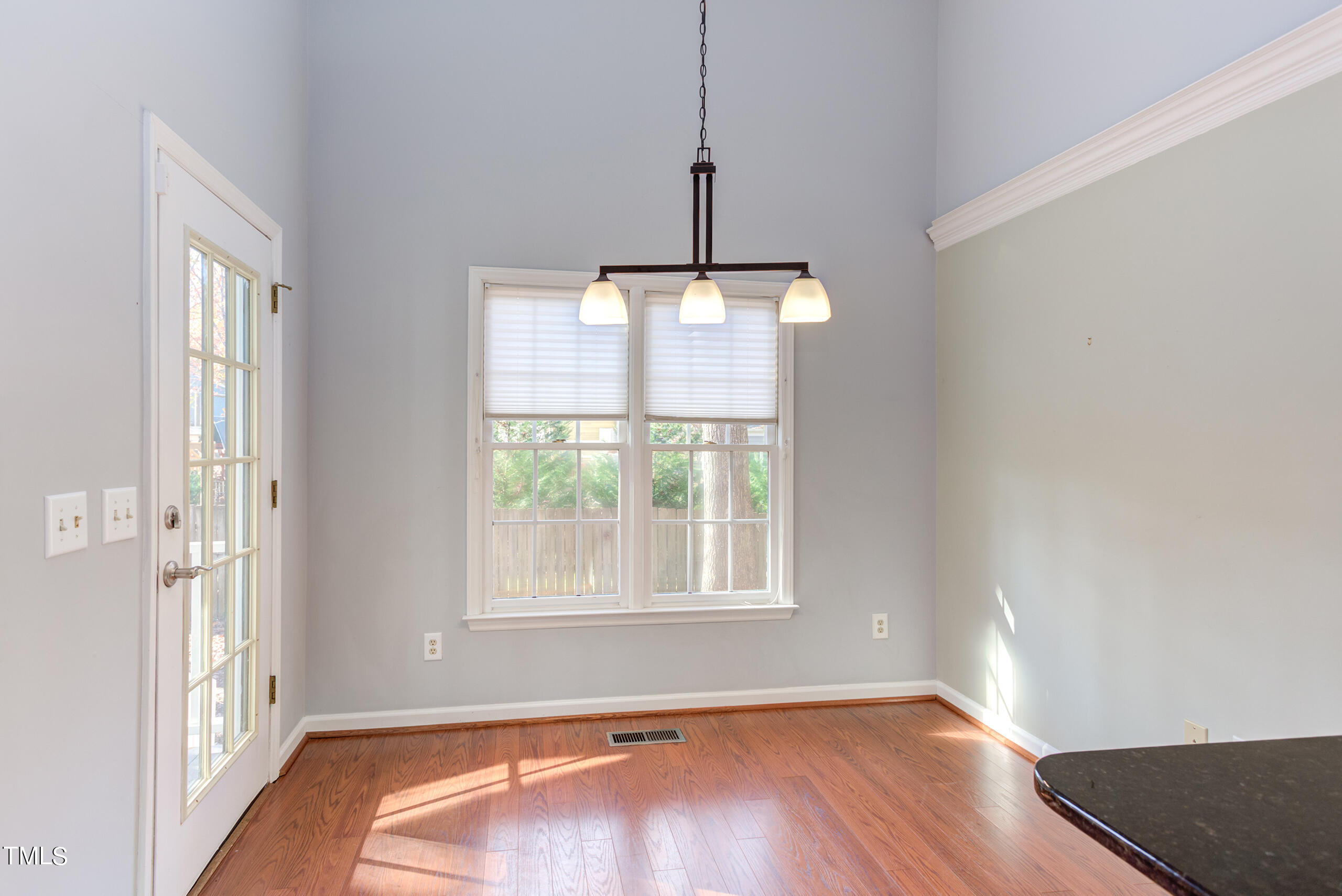 2800 Polesdon Court Raleigh, NC 27615 - Photo 10 of 21 Doors lead to your outdoor living space- patio and fire pit!