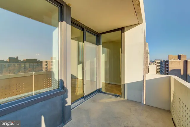 a view of a bathroom with a tub and shower