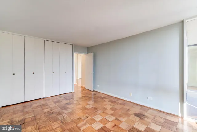 a view of an empty room and entryway