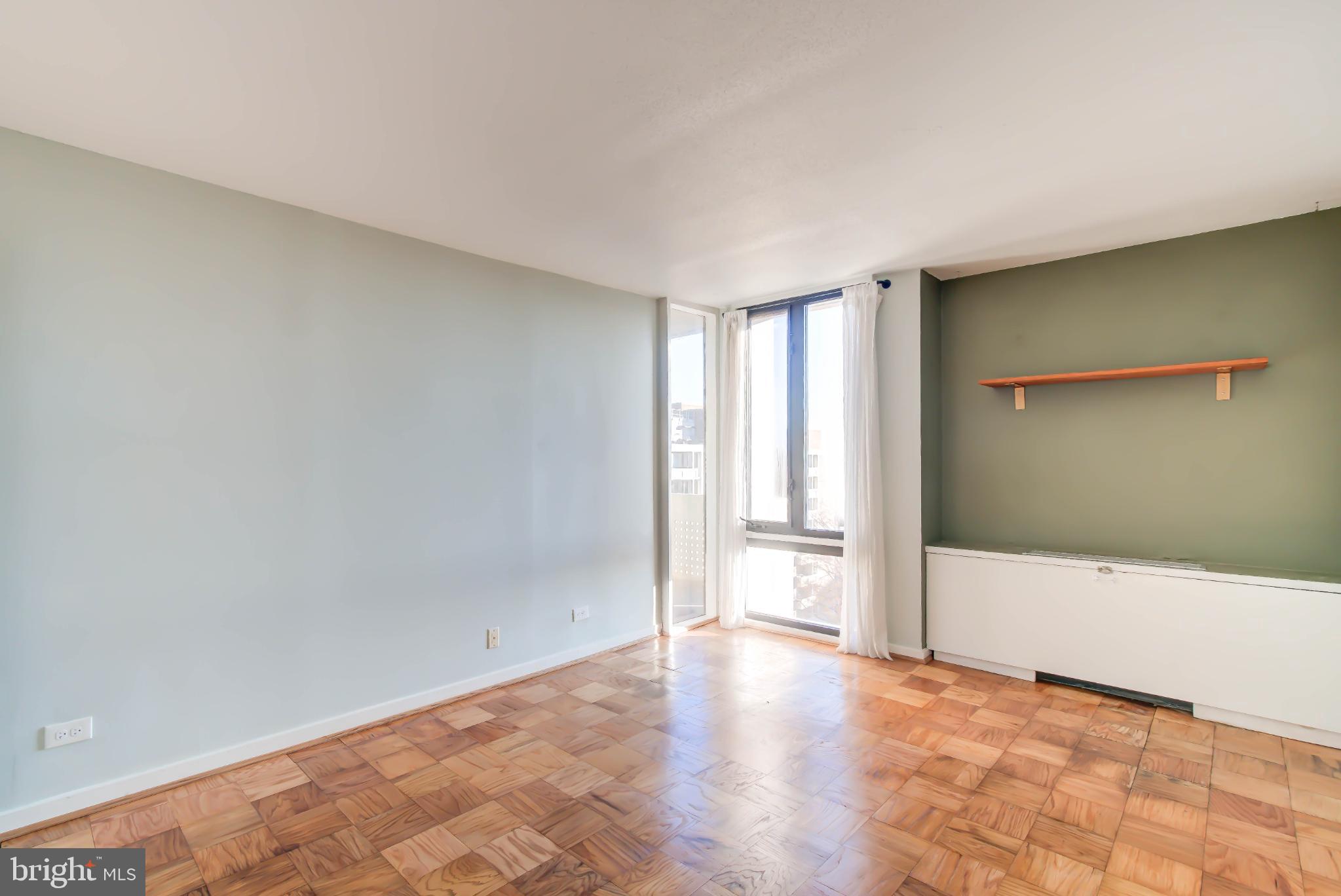 490 M Street Southwest, Unit W800 Washington, DC 20024 - Photo 10 of 21 a view of an empty room with a window