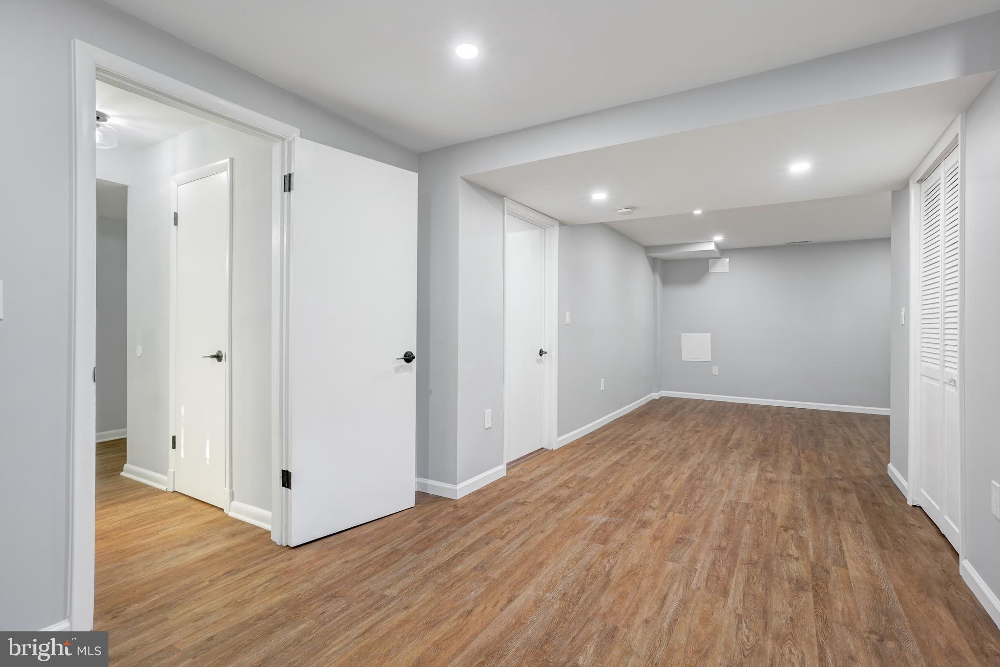 1446 Roxanna Road Northwest Washington, DC 20012 - Photo 24 of 34 a view of empty room with wooden floor