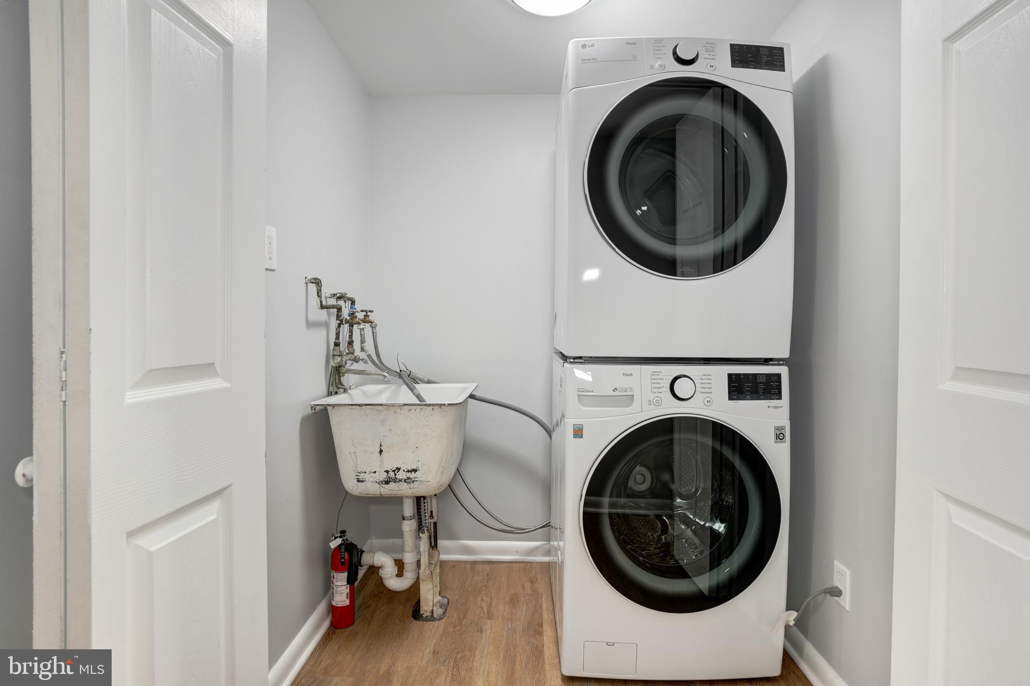 1446 Roxanna Road Northwest Washington, DC 20012 - Photo 28 of 34 a utility room with dryer and washer