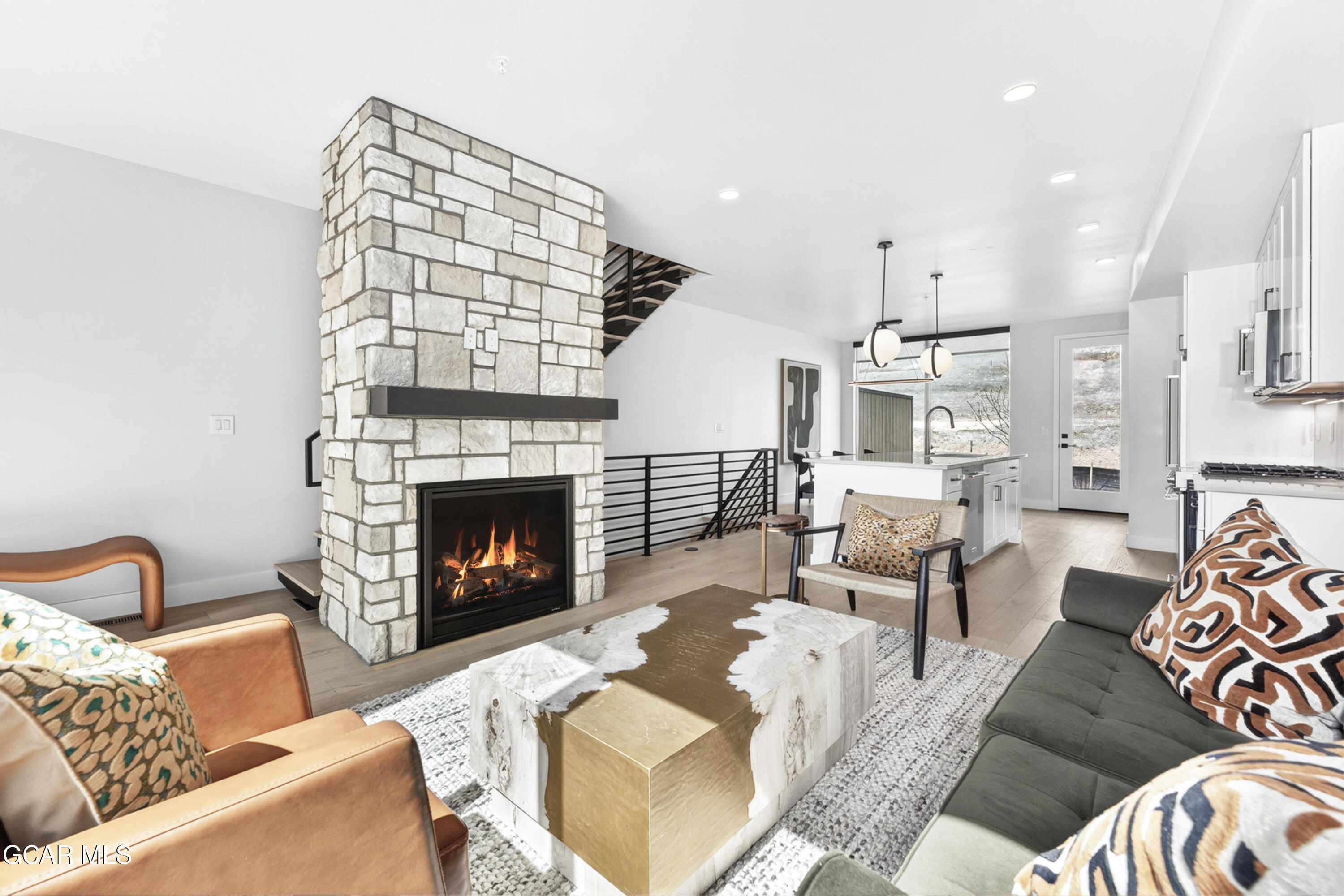 56 Wheeler Road Winter Park, CO 80482 - Photo 19 of 42 a living room with furniture and a fireplace