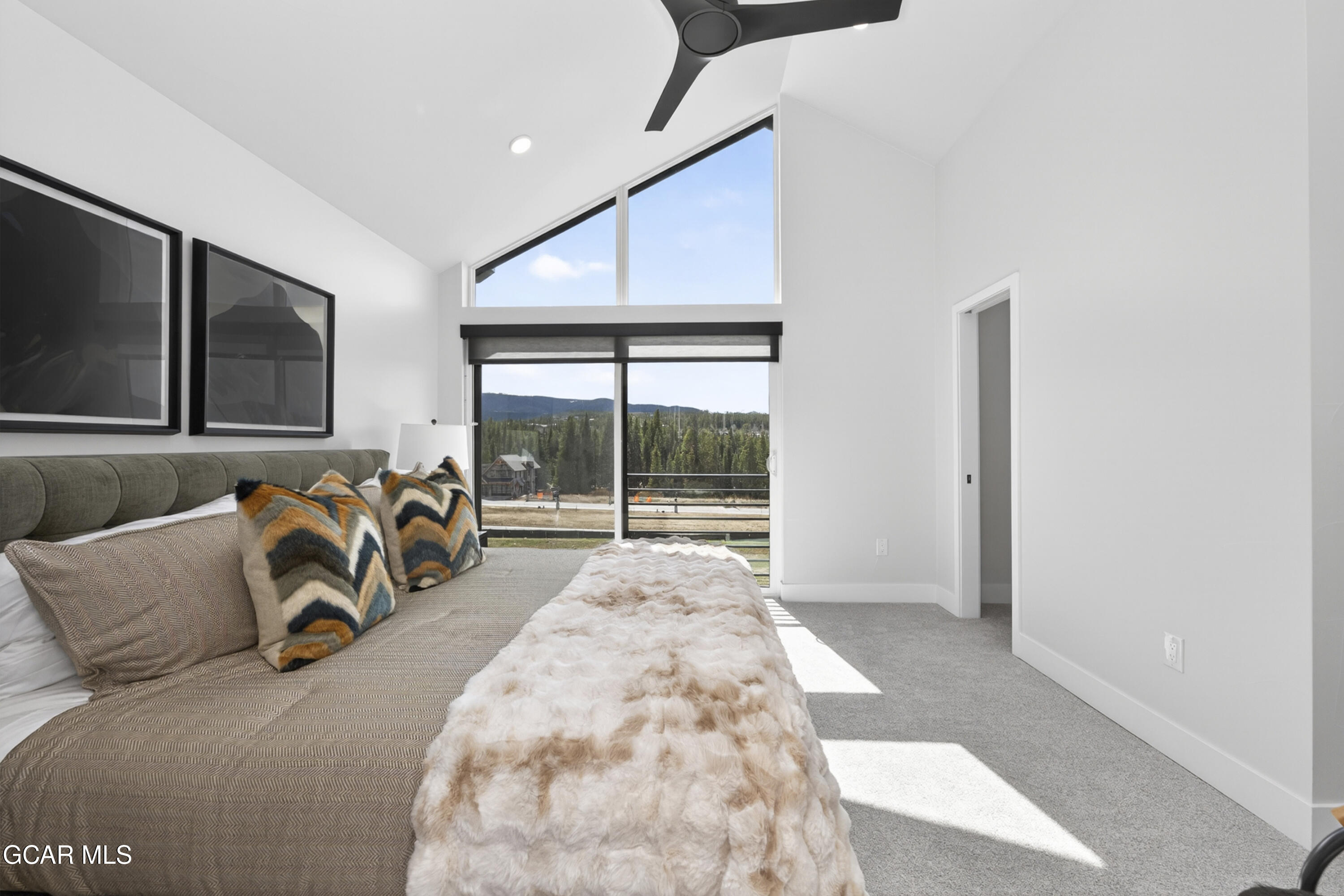 56 Wheeler Road Winter Park, CO 80482 - Photo 25 of 42 a bed room with a bed and a television