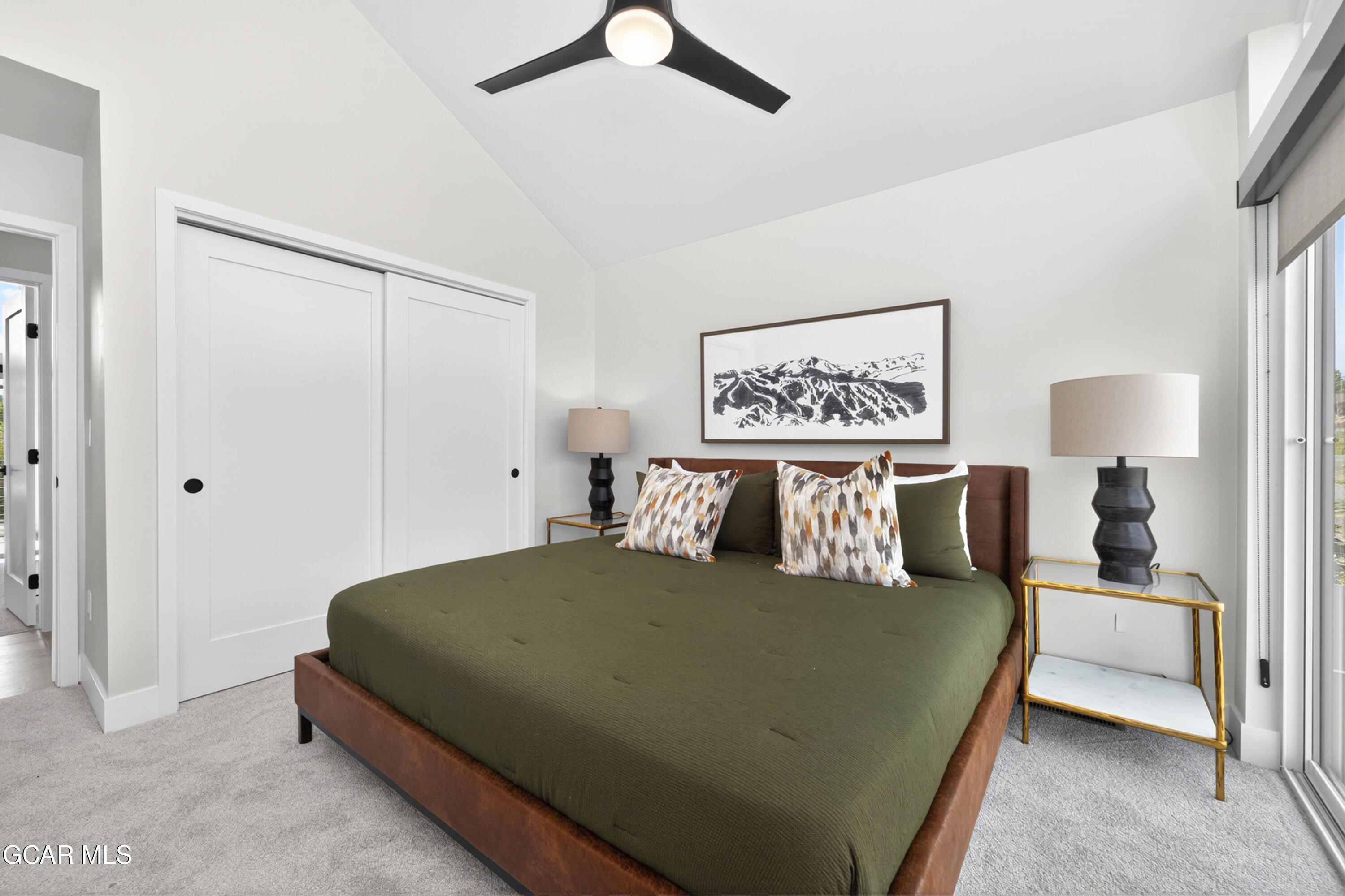 56 Wheeler Road Winter Park, CO 80482 - Photo 31 of 42 a bedroom with a bed and painting on the wall