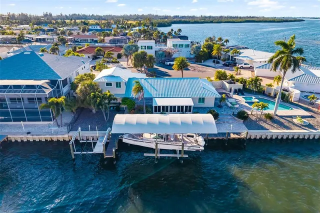 a picture of city view with lake view and boat