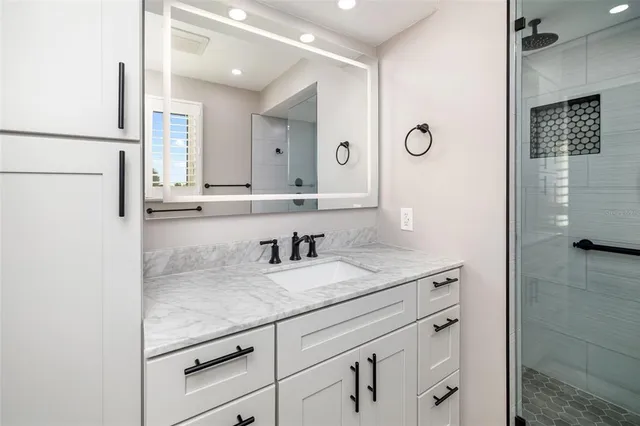 a view of a swimming pool with a lounge chairs