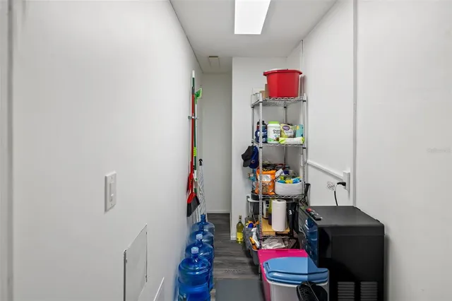 a view of a swimming pool with outdoor seating