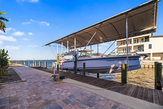 a view of a balcony with chairs