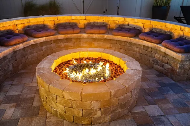 a view of empty room with wooden floor and cabinet