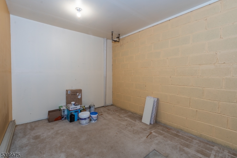 32 Sam Bonnell Drive Clinton, NJ 08809 - Photo 29 of 30 a view of a room with a table and chairs