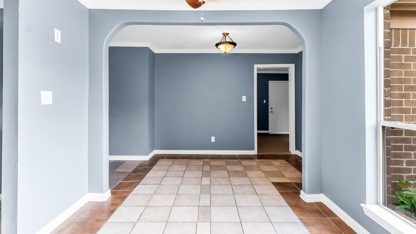 5534 Calm Court Houston, TX 77084 - Photo 13 of 48 The breakfast room is seamlessly connected to a spacious extended area that was previously incorporated as part of the garage. This extension allows for greater flexibility in the use of space.