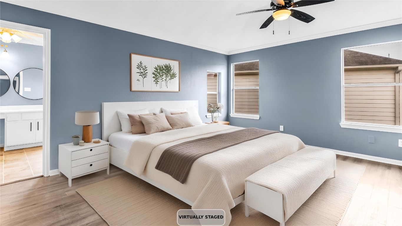 5534 Calm Court Houston, TX 77084 - Photo 20 of 48 a bedroom with bed and window
