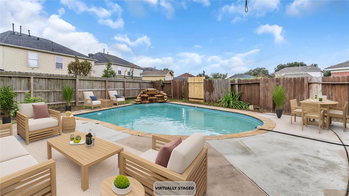 5534 Calm Court Houston, TX 77084 - Photo 37 of 48 an aerial view of a house with swimming pool and furniture