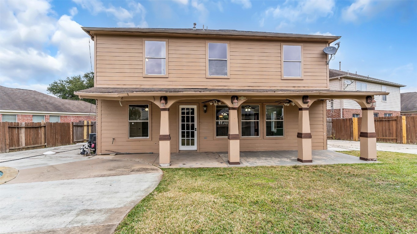 5534 Calm Court Houston, TX 77084 - Photo 40 of 48 front view of a house with a yard
