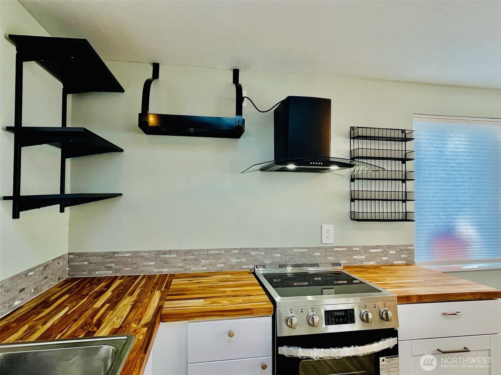 545 Hendricks Street, Unit 13 Port Townsend, WA 98368 - Photo 10 of 22 a room with storage and utility