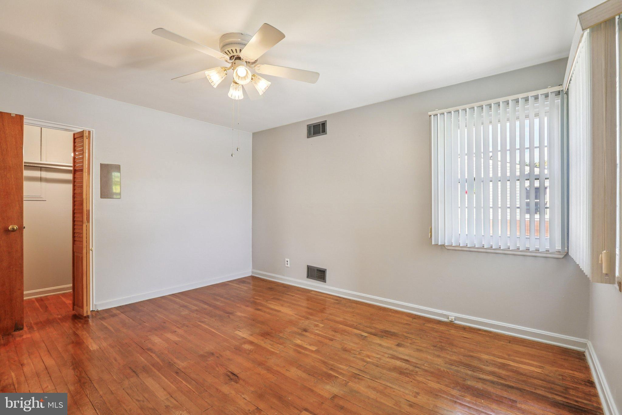 810 Lynvue Road Linthicum Heights, MD 21090 - Photo 18 of 45 Bright and airy room with hardwood floors.