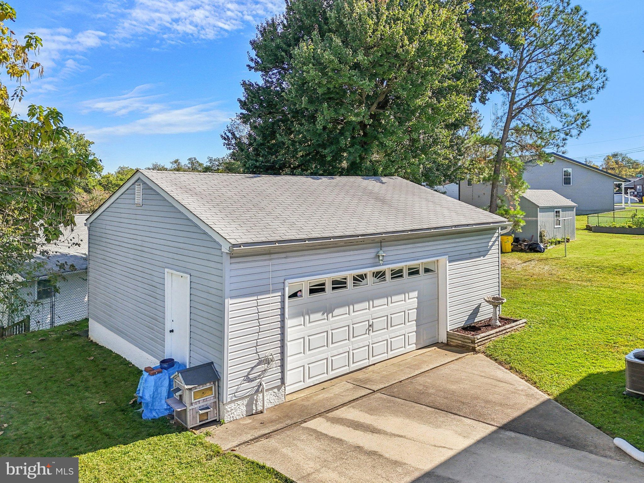 810 Lynvue Road Linthicum Heights, MD 21090 - Photo 36 of 45 Charming garage nestled in a serene setting.