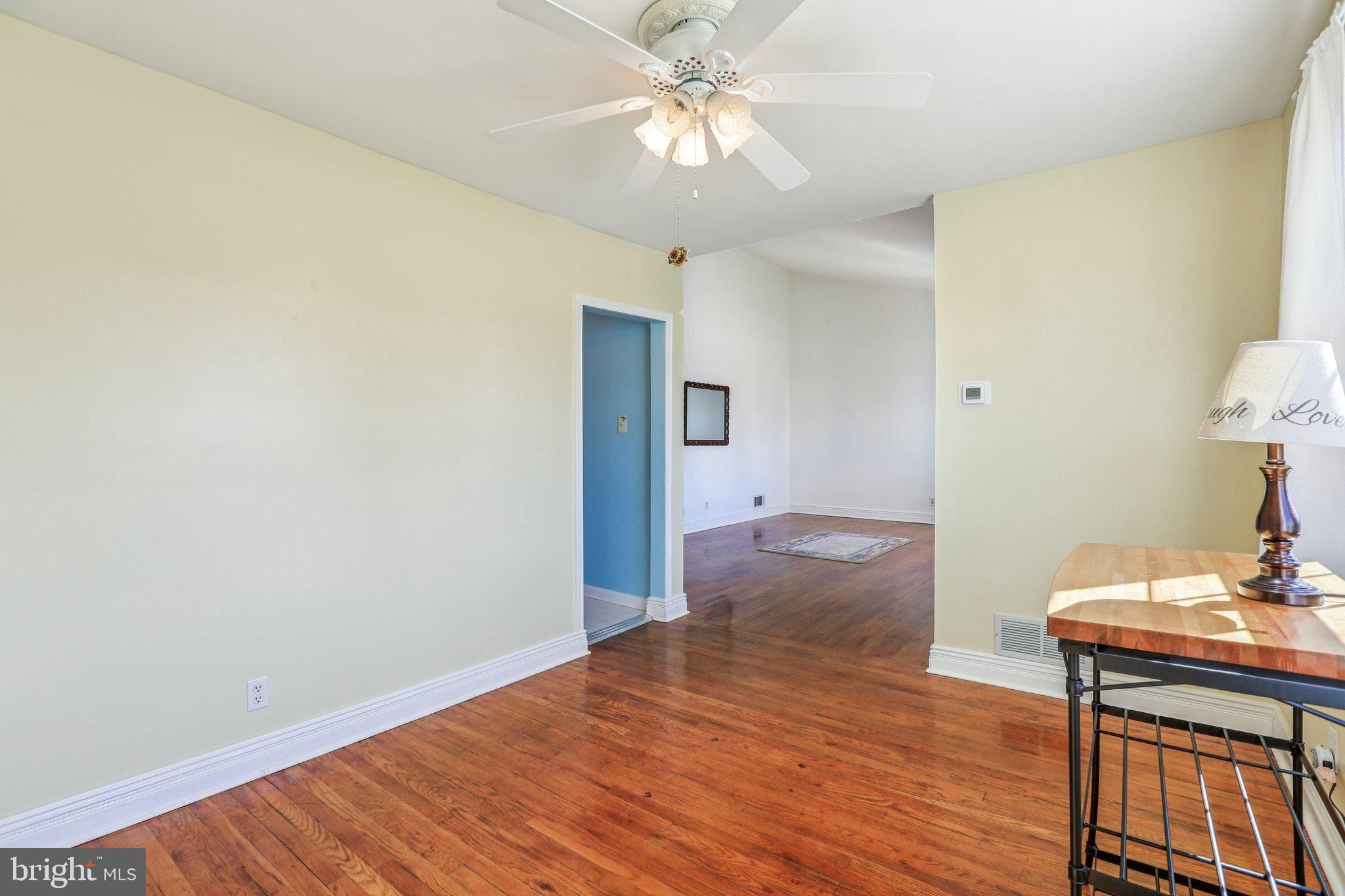 810 Lynvue Road Linthicum Heights, MD 21090 - Photo 7 of 45 Bright and airy space with warm wood floors.