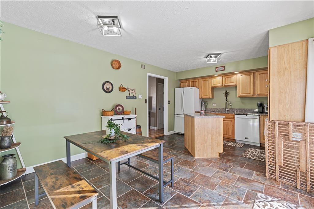 261 Casselman Road Markleton, PA 15551 - Photo 21 of 42 a workspace with furniture and kitchen view