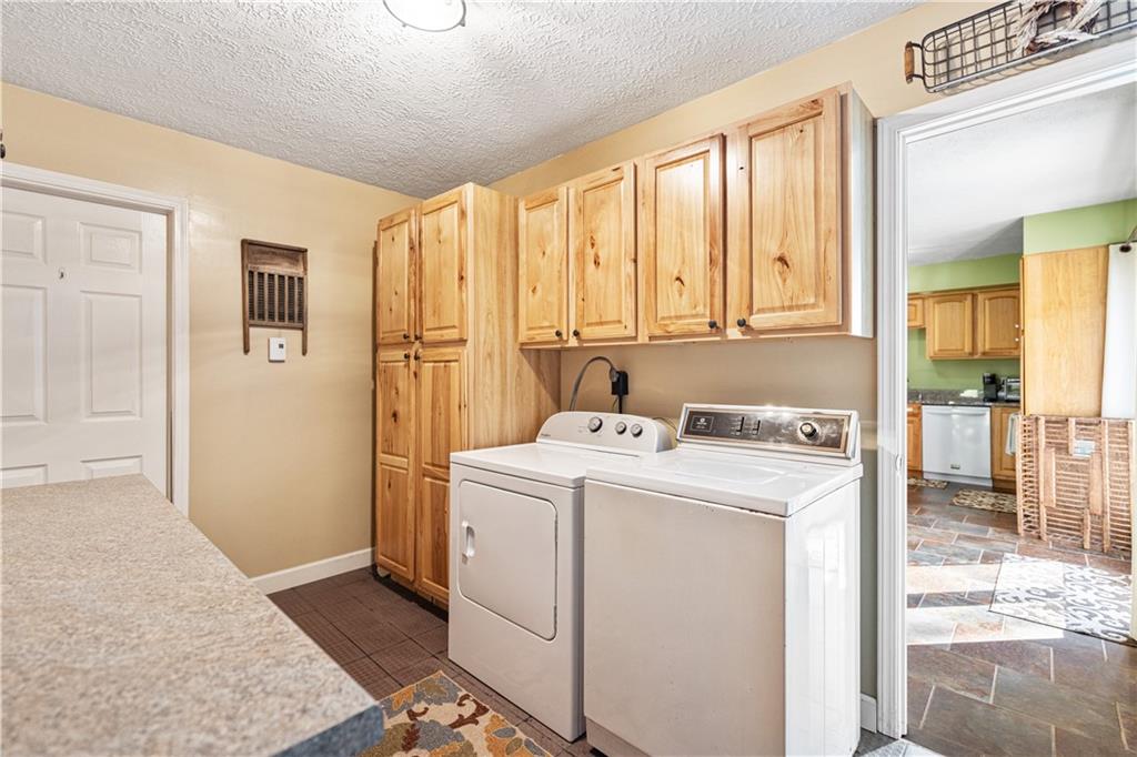 261 Casselman Road Markleton, PA 15551 - Photo 23 of 42 a view of utility room with washer and dryer