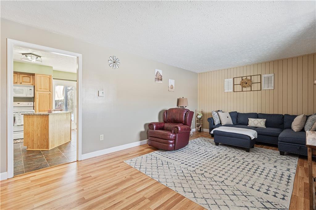 261 Casselman Road Markleton, PA 15551 - Photo 24 of 42 a living room with furniture and a rug