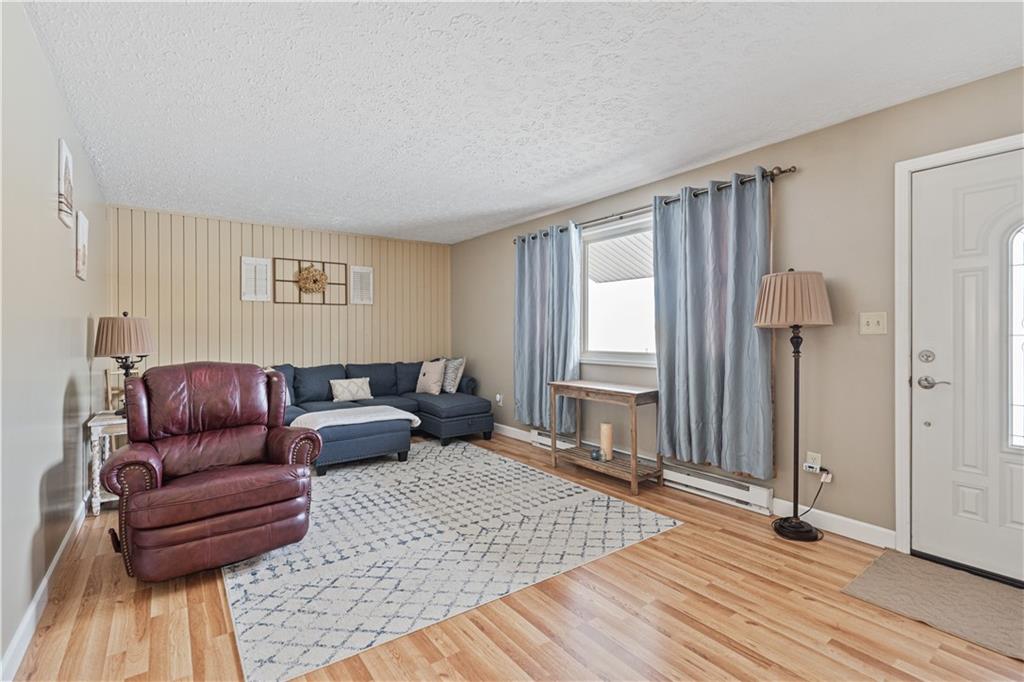 261 Casselman Road Markleton, PA 15551 - Photo 25 of 42 a living room with furniture and a window