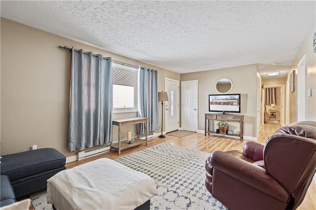 261 Casselman Road Markleton, PA 15551 - Photo 26 of 42 a bedroom with furniture and a window