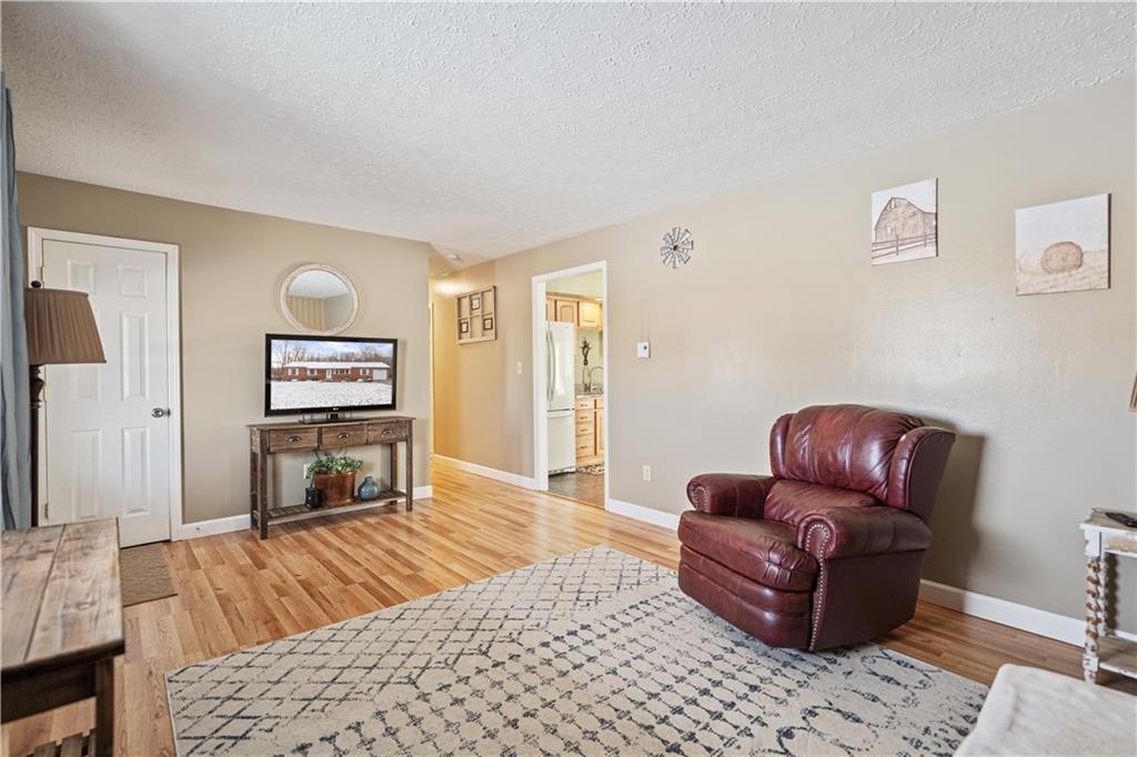 261 Casselman Road Markleton, PA 15551 - Photo 27 of 42 a living room with furniture and a wooden floor