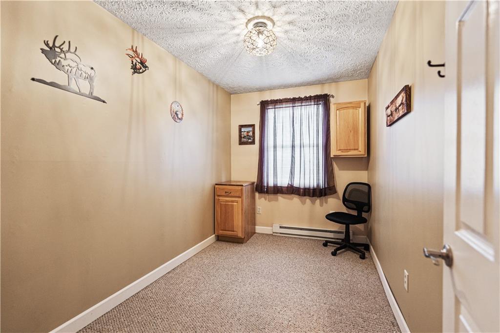261 Casselman Road Markleton, PA 15551 - Photo 35 of 42 a view of a livingroom with workspace and a window