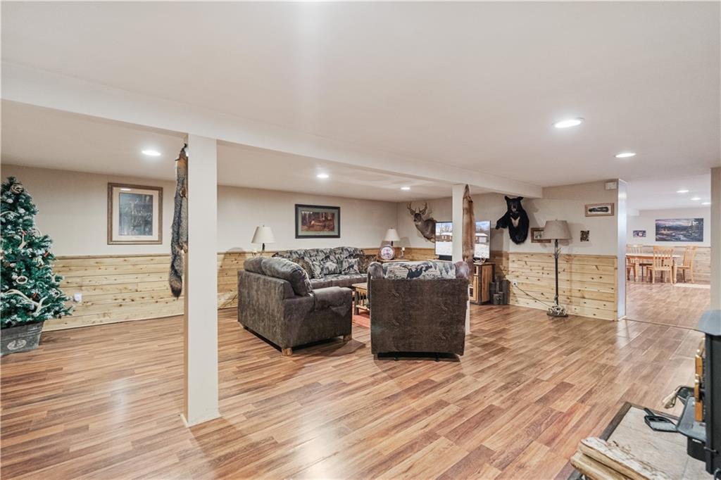 261 Casselman Road Markleton, PA 15551 - Photo 36 of 42 a living room with furniture kitchen view and a wooden floor