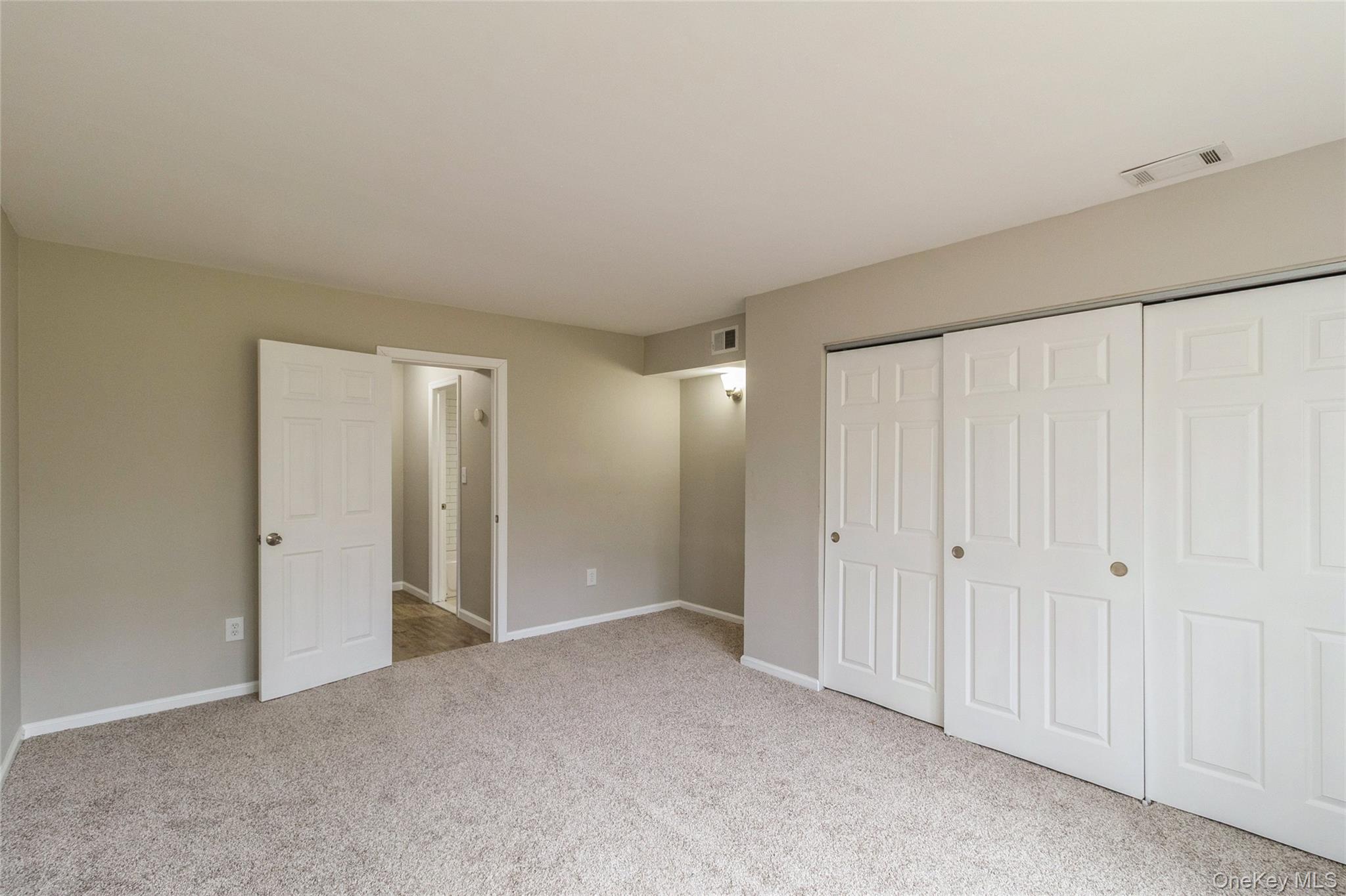 655 Middle Country Road, Unit 4D1 Coram, NY 11727 - Photo 21 of 27 a view of an empty room