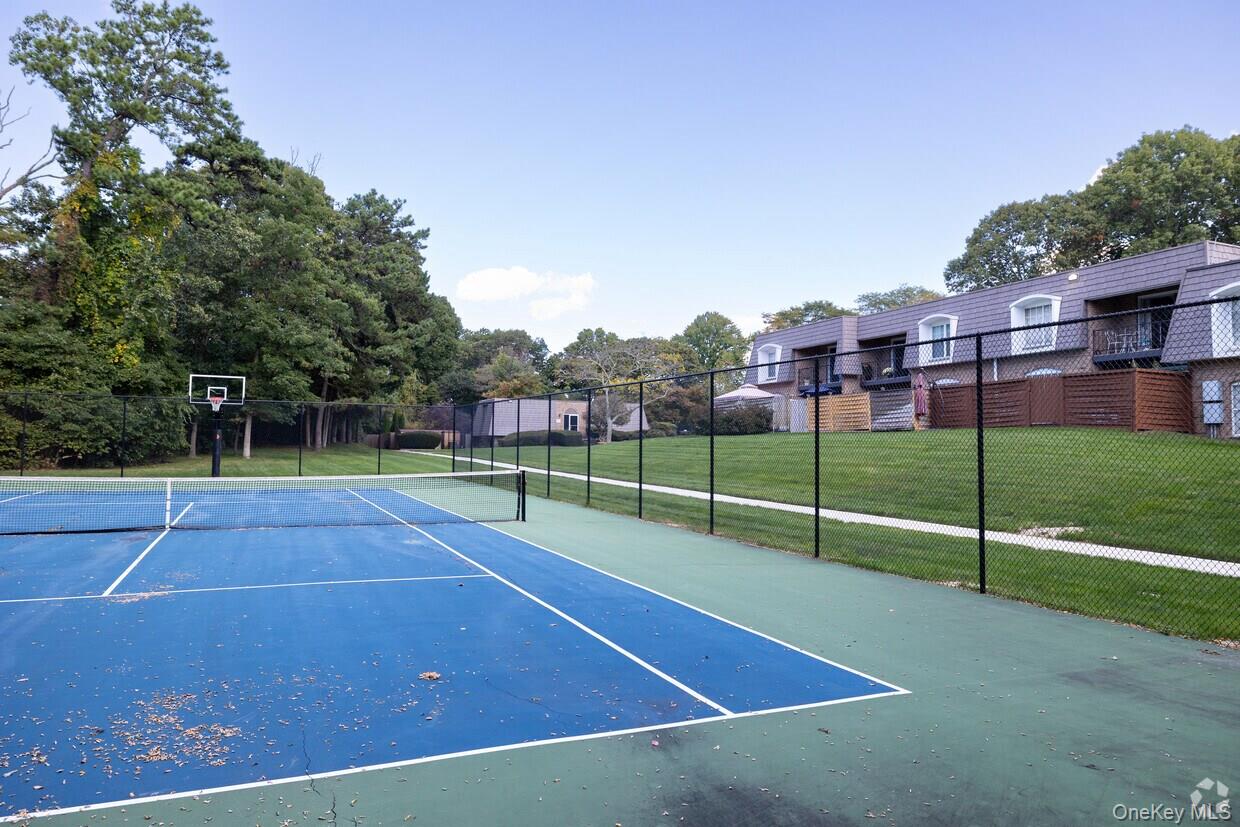 655 Middle Country Road, Unit 4D1 Coram, NY 11727 - Photo 27 of 27 a view of a tennis court