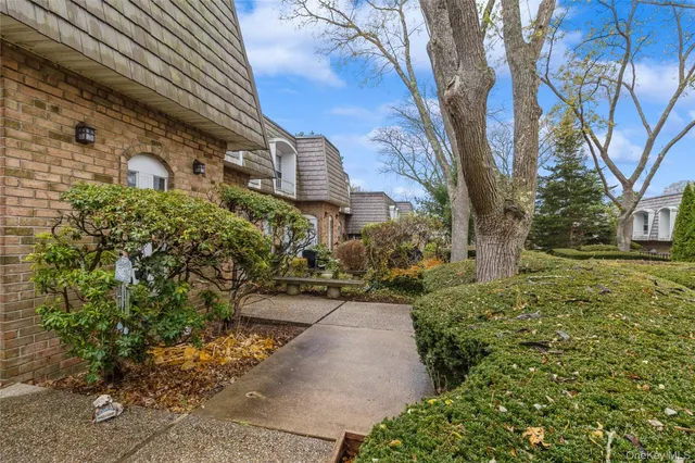 a view of a garden with pathway