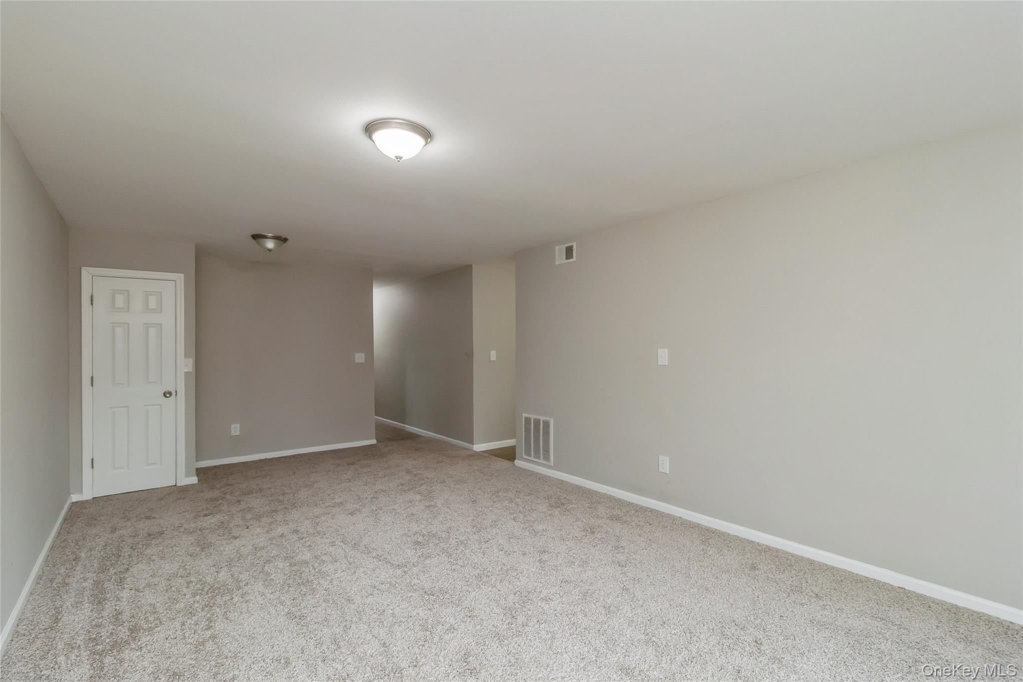 655 Middle Country Road, Unit 4D1 Coram, NY 11727 - Photo 9 of 27 a view of an empty room