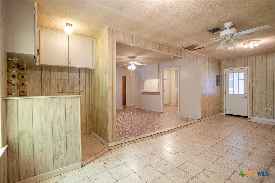 2903 Gayle Street Victoria, TX 77901 - Photo 10 of 21 a view of a hallway with wooden shelves