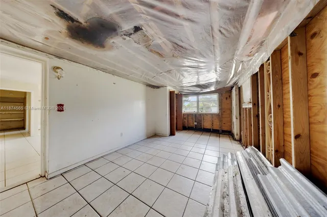 a view of wooden floor with an outdoor space