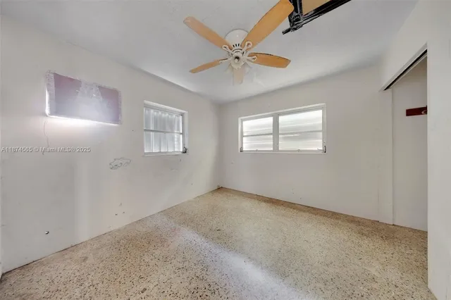 a bathroom with a sink a toilet and bathtub