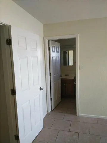 a view of a utility room with a sink