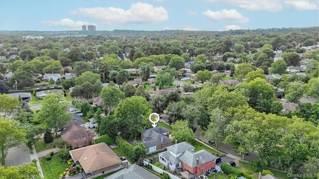 an aerial view of a city with lots of residential buildings