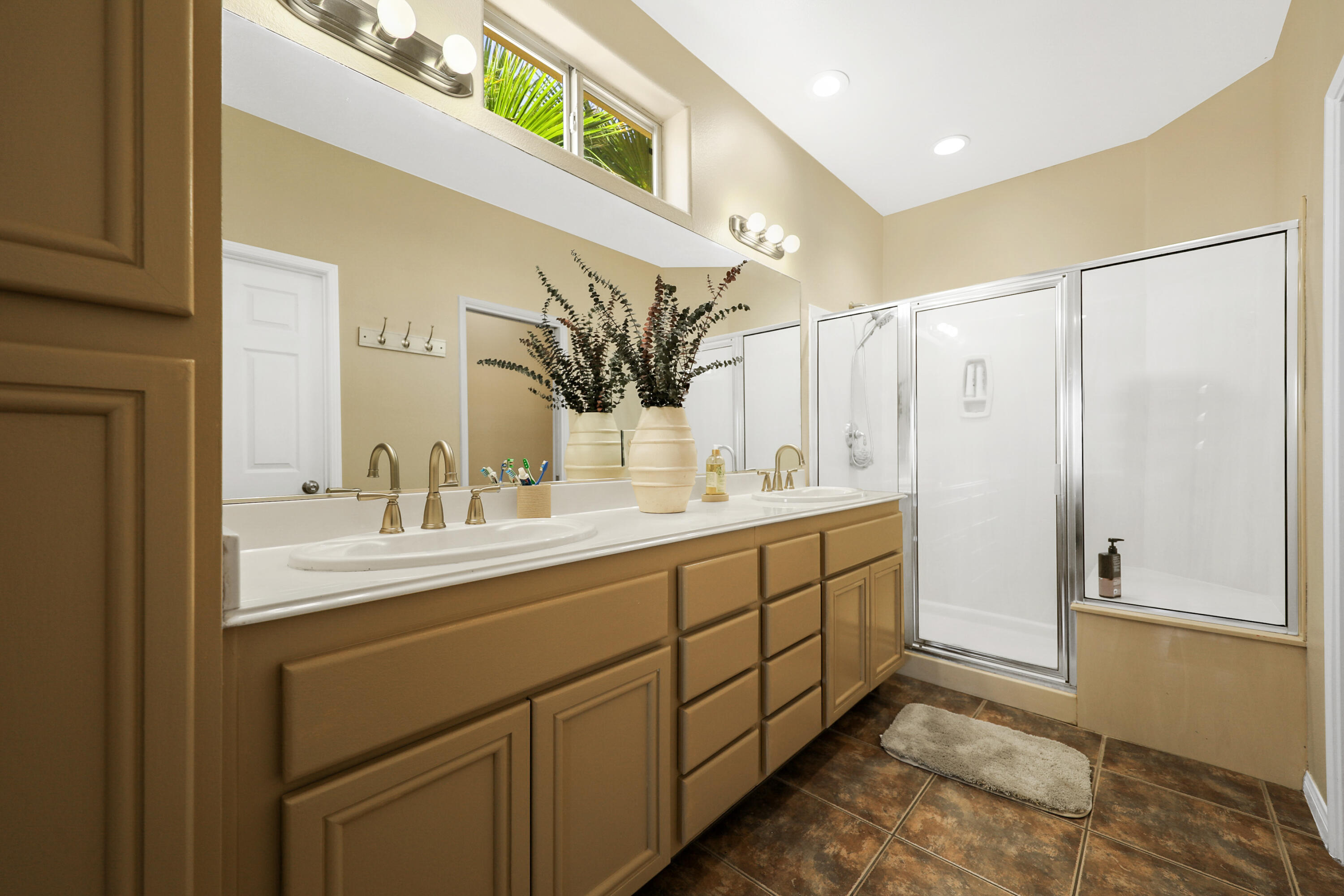 79948 Bethpage Avenue Indio, CA 92201 - Photo 15 of 30 a bathroom with a double vanity sink mirror and
