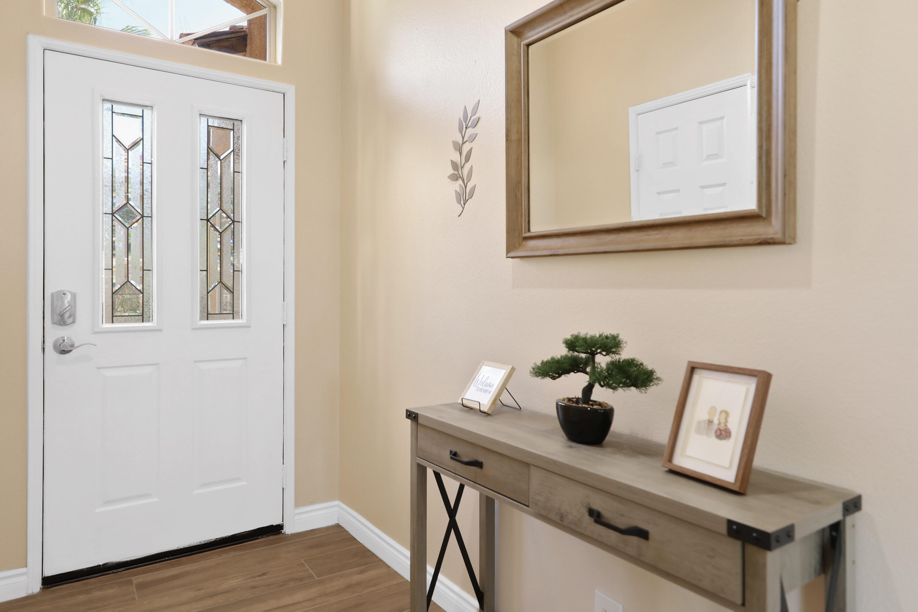 79948 Bethpage Avenue Indio, CA 92201 - Photo 4 of 30 a view of table room and wooden floor