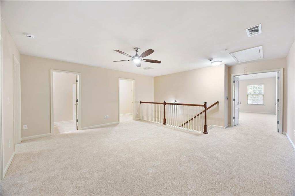 2296 Thackery Road Southwest Snellville, GA 30078 - Photo 12 of 26 a view of an empty room with a window
