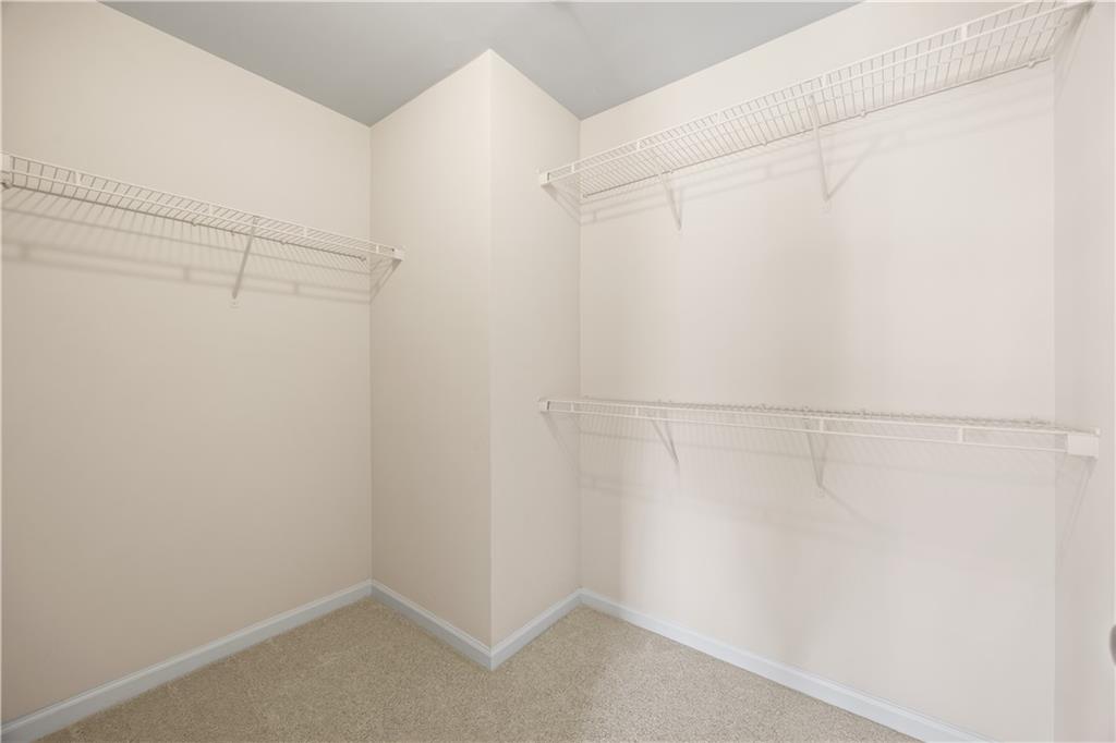 2296 Thackery Road Southwest Snellville, GA 30078 - Photo 16 of 26 a view of a room with racks on the wall