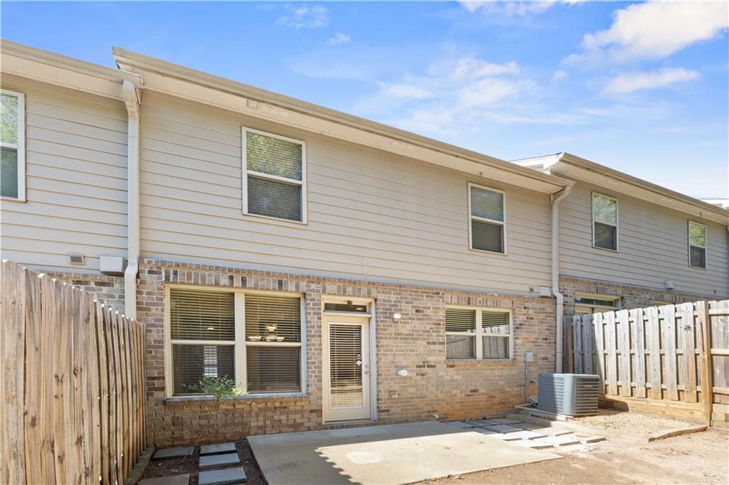 2296 Thackery Road Southwest Snellville, GA 30078 - Photo 24 of 26 a front view of a house