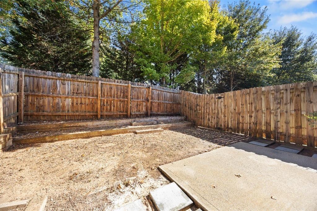 2296 Thackery Road Southwest Snellville, GA 30078 - Photo 26 of 26 a view of a backyard